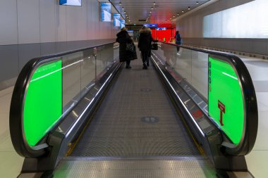 Escalator in a subway station. How we imagined our paths to look like, without fails, only straight line to success. clipart