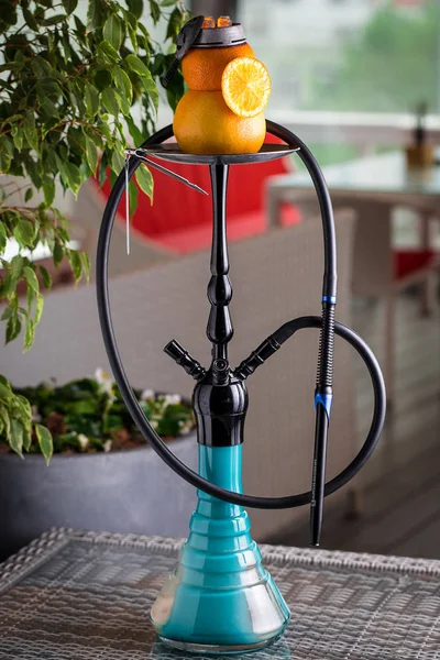 Modern hookah with fruit bowl on the table — Stock Photo, Image