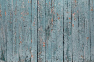 Kırık gri-mavi boyalı eski boyalı ahşap çit dokusu