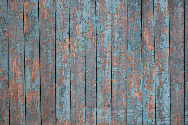 带有裂开的灰蓝色油漆的旧漆木栅栏的纹理 — 图库照片