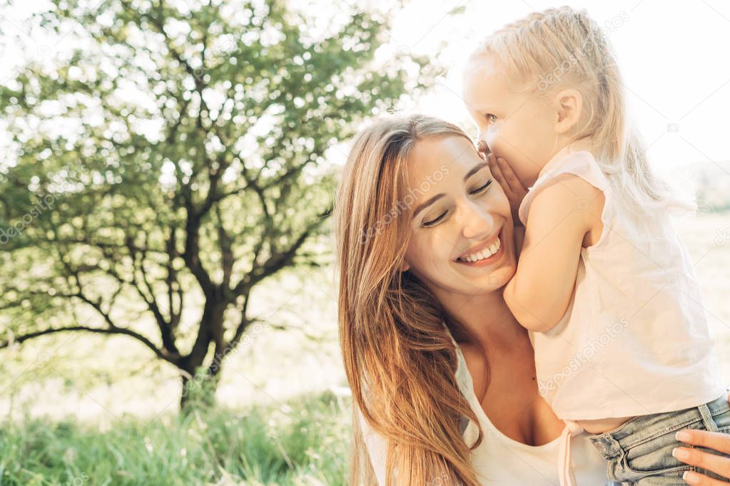 Happy Mother and Daughter Having Fun, Enjoying Sunny Summer