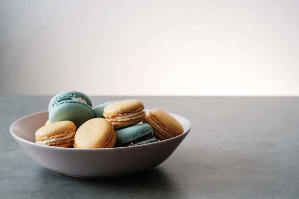 The Plate is Filled with Colorful Delicious French Macarons