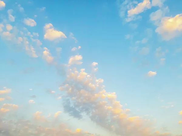 Background, blue sky with yellow clouds for desktop etc.