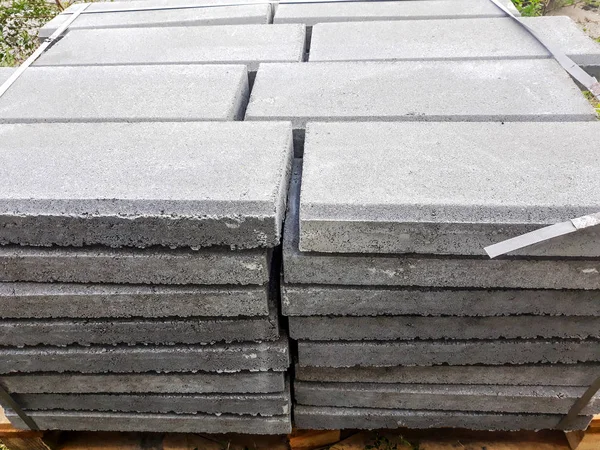 Sokak zemin için gri kaldırım fayans dokusu. Çimento tuğla kare taş zemin arka plan. Beton döşeme döşeme taşları.