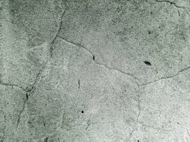 Arka plan alçı. Çimento duvar doku çatlaklar. Eski duvar.