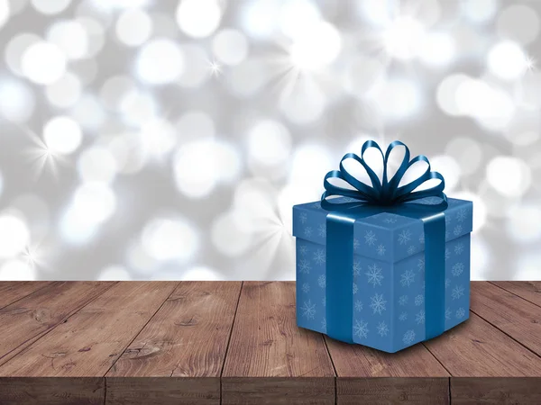 Christmas gift box on wood table over white bokeh background