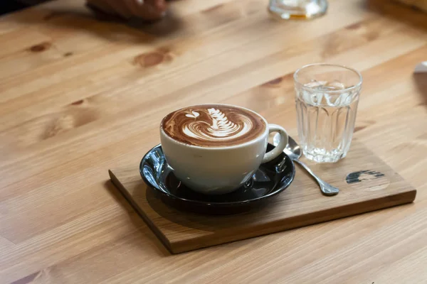 Cup of coffee with beautiful Latte art — Stock Photo, Image