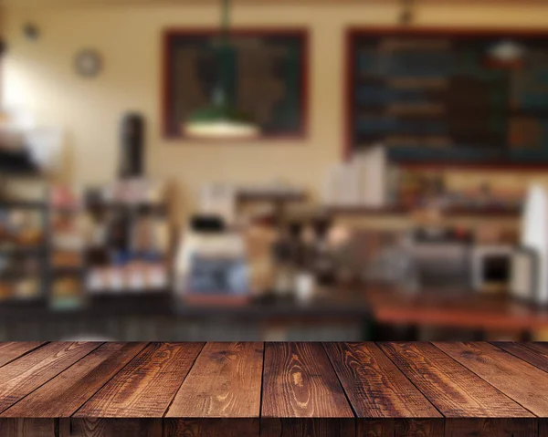 Plataforma de espacio de mesa de madera vacía y fondo borroso café —  Fotos de Stock