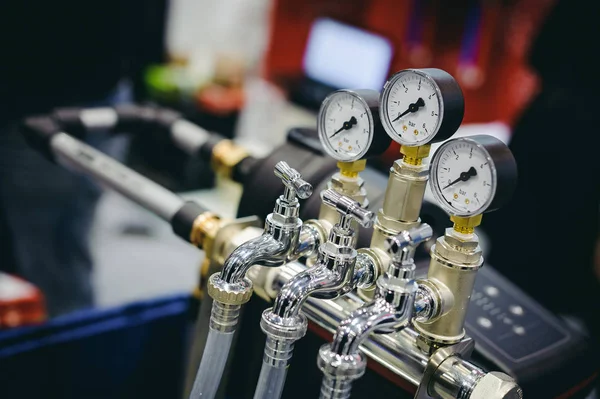 Thermometer, pipes and faucet valves of heating system in a boiler room. — Stock Image Thermometer Pipes Faucet Valves Heating System Boiler Room Royalty Free Stock Photos