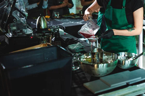 championship among coffee houses, members of teams show barista\'s skill, prepare drinks, teamwork