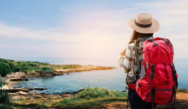Asian woman backpack on sea, journey on holiday concept
.