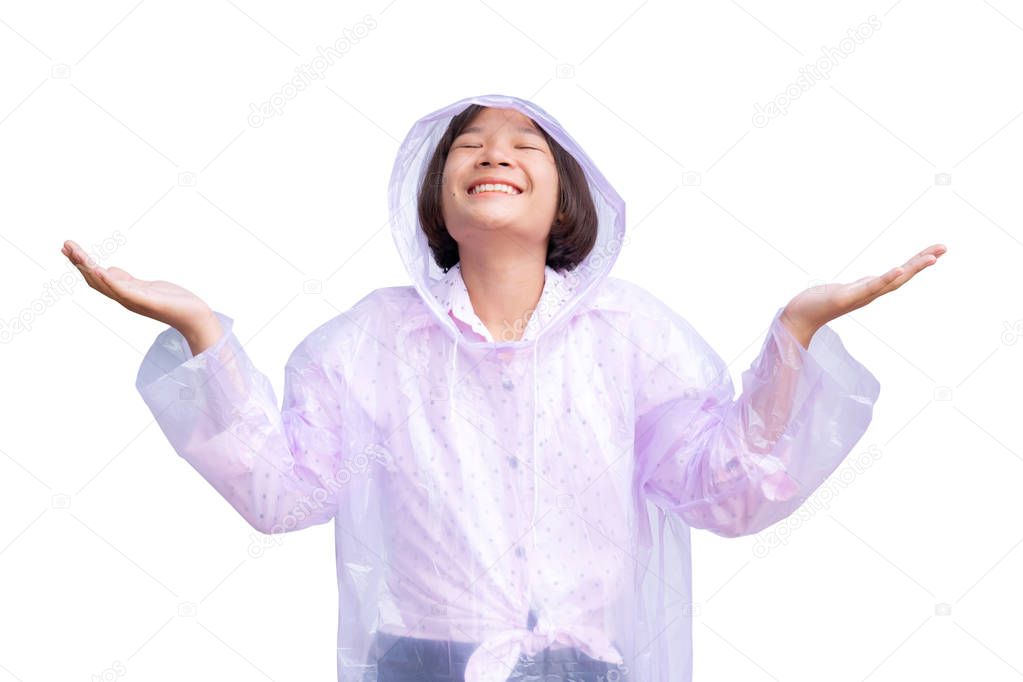 Cute Asian girl in raincoat on the white background. The rainy season concept.