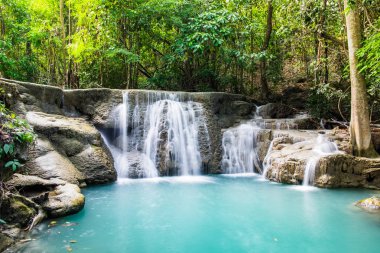 Waterfall deep forest scenic natural at huai mae khamin national park,kanchanaburi,thailand clipart