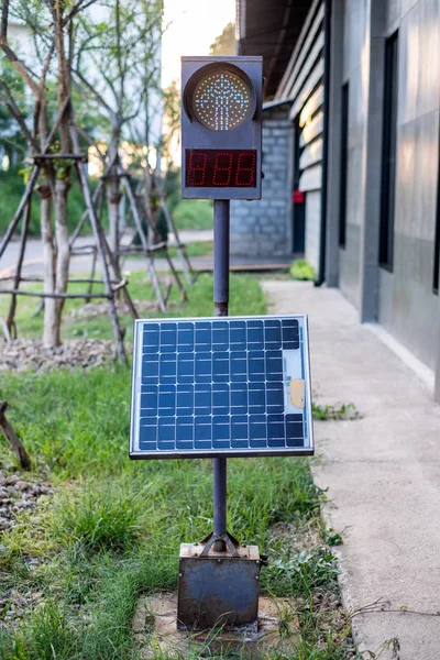 Traffic light signal with panel solar cell set up on park
