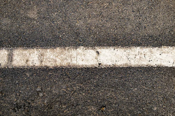 Línea Blanca Sobre Fondo Texturizado Camino Negro — Foto de Stock