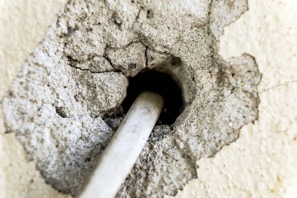 Wire into crack cement — Stock Photo, Image