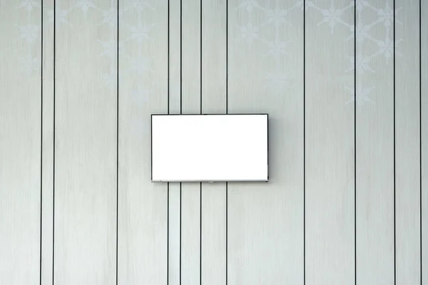 Üres lapos képernyős tv a dekoratív fal — Stock Fotó