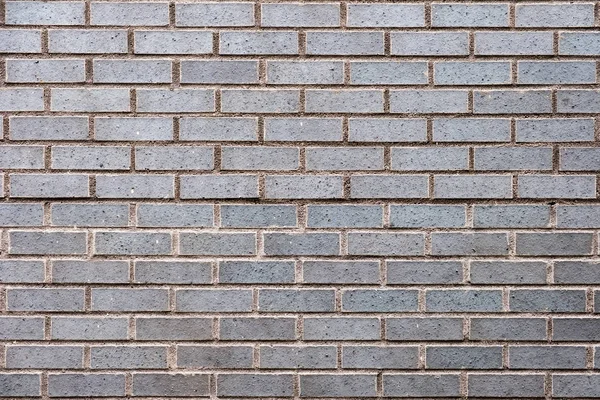 Weathered grey stained brick wall — Stock Photo, Image