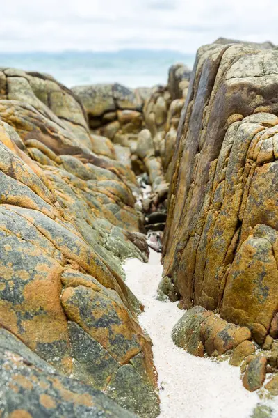 Route stone on sand — Stock Photo, Image