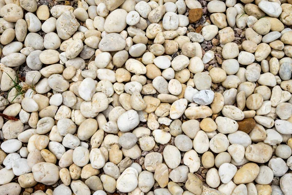 Piedras redondas naturales fondo de piedra — Foto de Stock