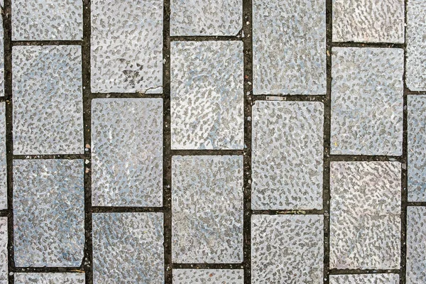 Gray stone tiles texture background