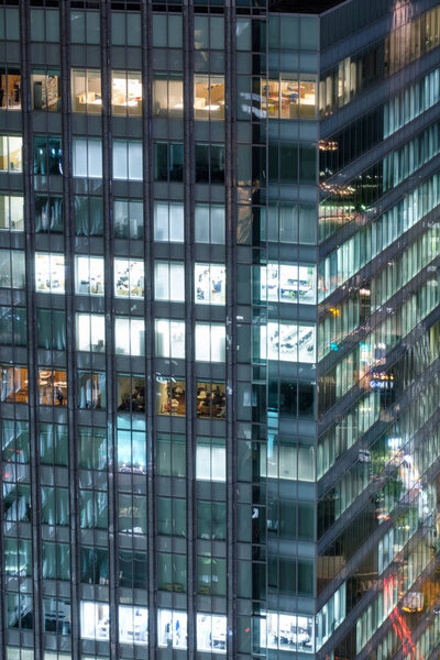 Modern building skyscraper glass window with illuminated