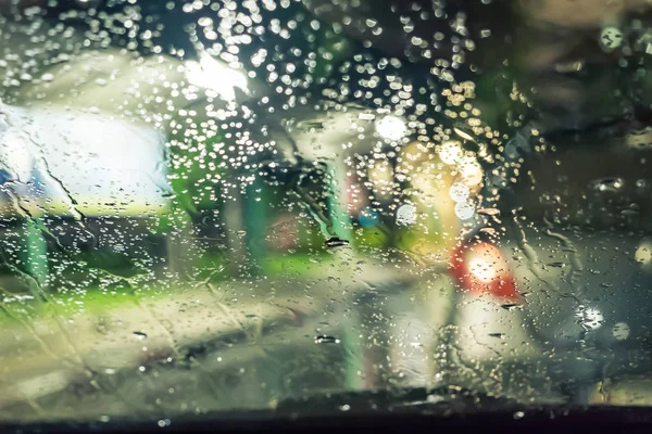 Blurred defocused rain windshield light — Stock Photo, Image