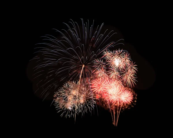 Explosion abstraite de feux d'artifice colorés et festifs sur fond noir — Photo