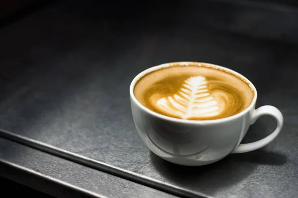 Coffee latte flower art shape in freezer — Stock Photo, Image