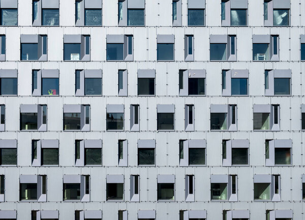 Pattern glass windows on residence building background