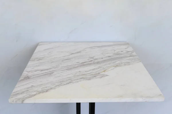 Marble table adjoining on marble wall