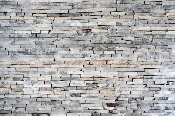 Horizontal apilado pared de ladrillo de piedra de granito — Foto de Stock