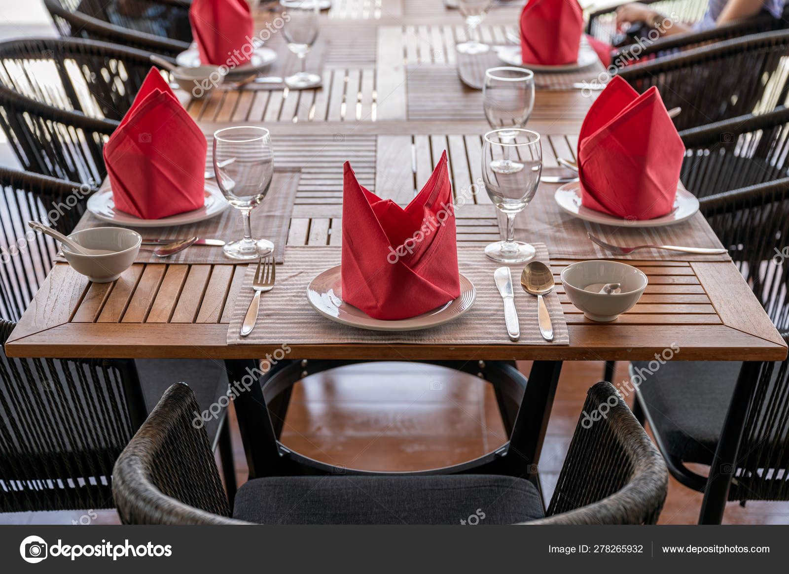 Set Of Equipment On Wooden Dining Table In Restaurant