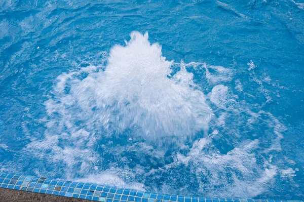 Water spouting in swimming pool