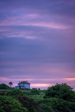 St. Ives, Cornwall, İngiltere, İngiltere'de yakın Cornish kıyısında güzel renkli gün batımı