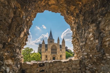 View of the magnificent Rochester Cathedral through the arched castle window, Kent, UK clipart