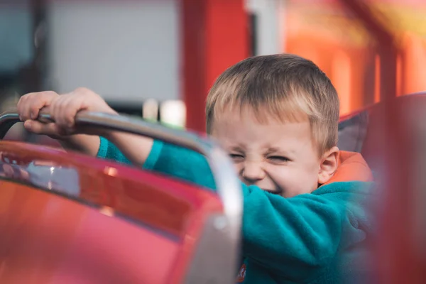 Little Cute Caucasian Boy Sitting Roofless Car Carousel Amusement Park — Stock Photo, Image