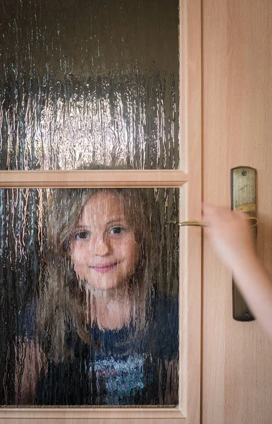 Portrait Cute Little Caucasian Girl Hiding Door Glass Windows While — Stock Photo, Image