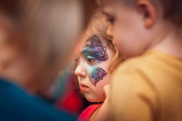 Butterfly girl on a party — Stock Photo, Image