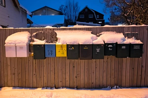 Letterboxes in front of a home in winter — Stock Photo, Image