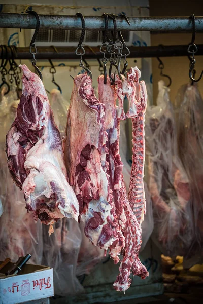 Lamb and cow carcass meat on hooks — Stock Photo, Image