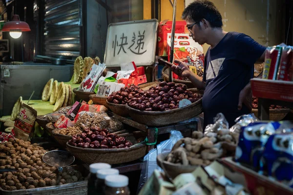 Fruit and snack seller in Muslim Quarter in Xian — Stock Image Fruit and snack seller in Muslim Quarter in Xian Stock Picture