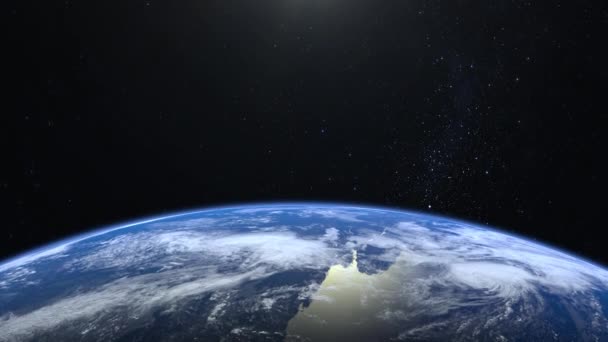 Earth from space. Stars twinkle. No sun in the frame. Flight over the Earth. 4K. Sunrise. The earth slowly rotates. Realistic atmosphere. 3D Volumetric clouds. The camera 36mm moves forward. — Stock Video