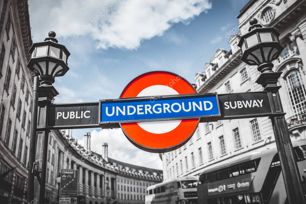 LONDON, UK - May 19, 2017: Londons famous underground sign located over the entrance to the station.