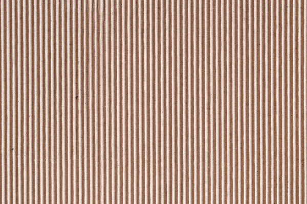 Corrugated cardboard or brown paper box sheet texture for background