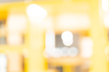 Tasarım için alışveriş merkezinde soyut sarı bulanıklık arka plan 