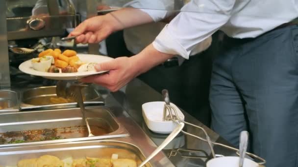 Business catering people take buffet food during company event — Stock Video