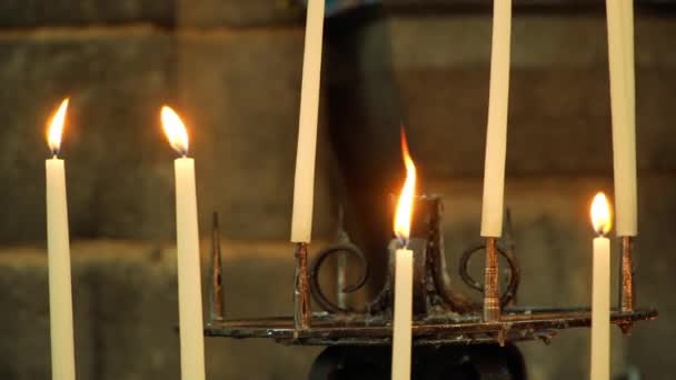 Background candles burning in the Church — Stock Video