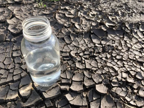 Water bottle on ground — Stock Photo, Image