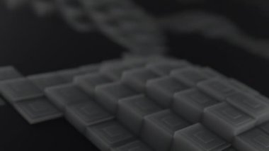 3D şekiller kusursuz bir video gibi hareket ediyor. Karanlık, pürüzsüz, hareketsiz karelerin arka planı. Küpler yukarı aşağı hareket eder ve büyüleyici bir zemin oluşturur. Parlak renk ve pürüzsüz animasyon 3D sanat. 4K Çözünürlüğü